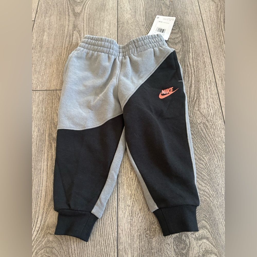 Nike Kids' Black and Gray Joggers with Red Logo